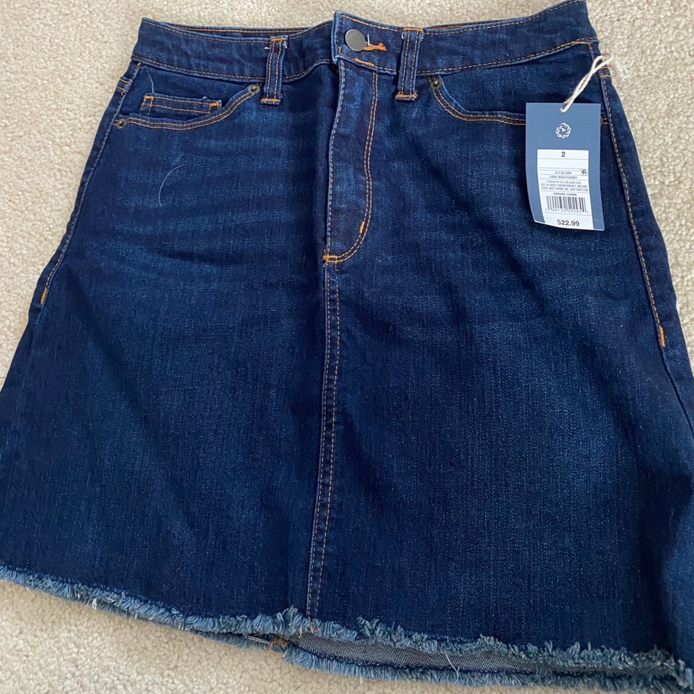 Brand new, never worn, dark wash denim skirt size 2 (runs big)